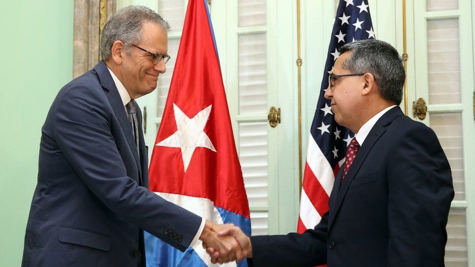 Chief of Mission at the US Interests Section in Havana Jeffrey DeLaurentis (L) meets Cuban interim Foreign Minister, Marcelo Medina (R), in Havana, Cuba on 1 July 2015