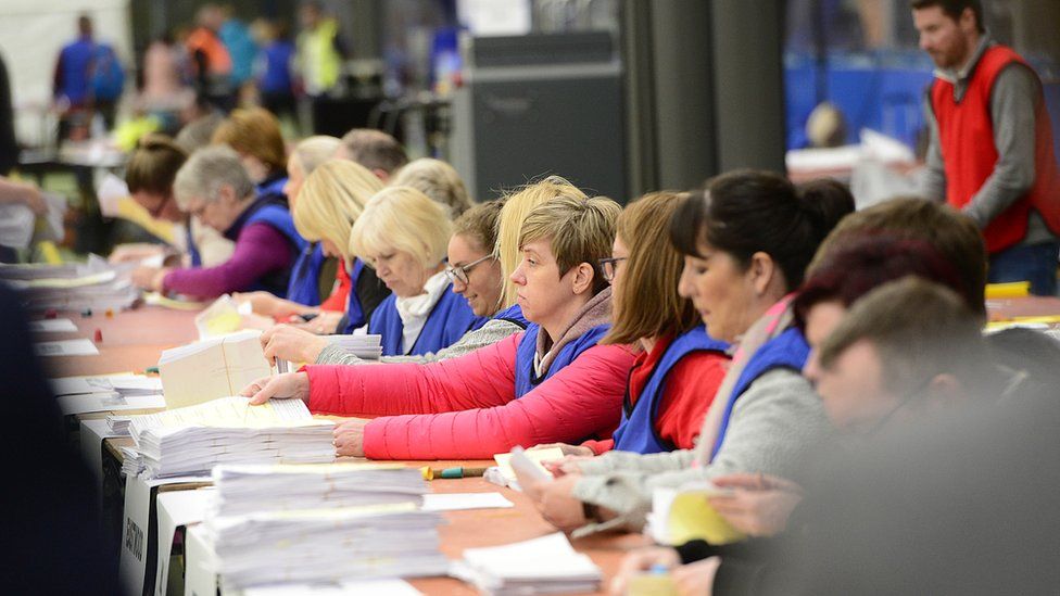 Counting staff working at the count centre in Magherafelt