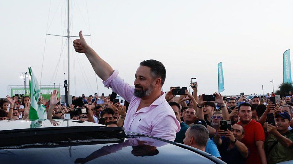 Spain's far-right Vox party leader Santiago Abascal gestures to his supporters during an opening campaign rally