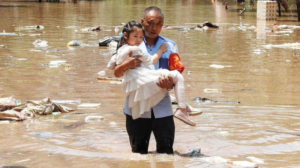 Man in flood in China