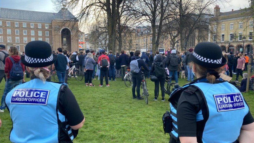 Officers standing in the foreground policing the College Green protest on 30 March