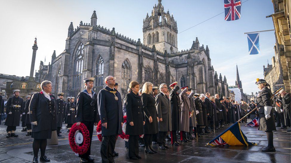 First Minister of Scotland Nicola Sturgeon and the Lord Provost of the City of Edinburgh Robert Aldridge, along with other dignitaries and members of the Armed Forces during a Remembrance Sunday service and parade in Edinburgh. Picture date: Sunday November 13, 2022. PA Photo. See PA story MEMORIAL Remembrance Scotland. Photo credit should read: Jane Barlow/PA Wire