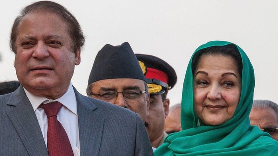 Prime Minister of Pakistan Nawaz Sharif poses with his wife Kulsoom Nawaz Sharif upon his arrival for the 18th SAARC Summit in 2014 in Kathmandu, Nepal
