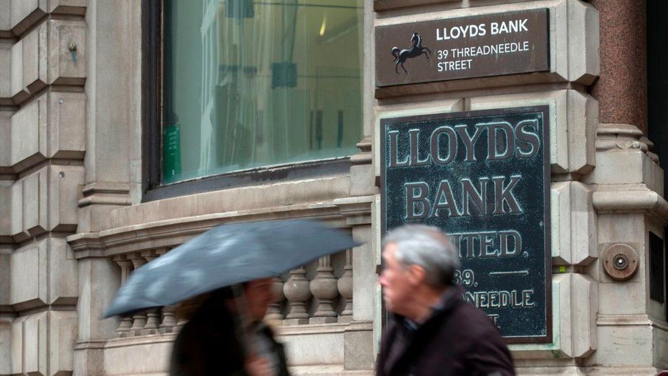 People standing outside Lloyds Bank in the City of London