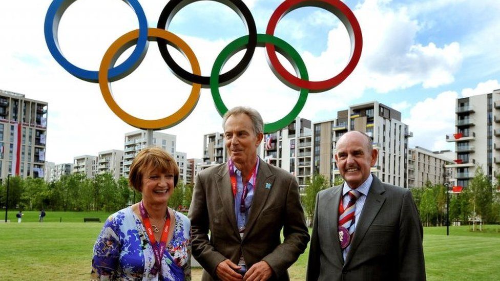 Tessa Jowell, Tony Blair and Sir Charles Allen, the mayor of the Olympic Athletes village, in 2012