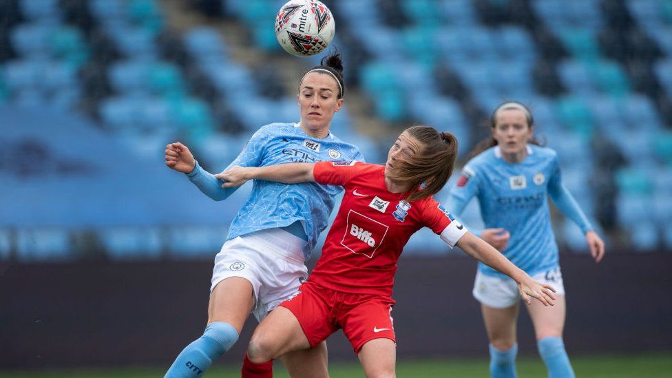 Lucy Bronze of Manchester City and Christie Murray of Birmingham City in action