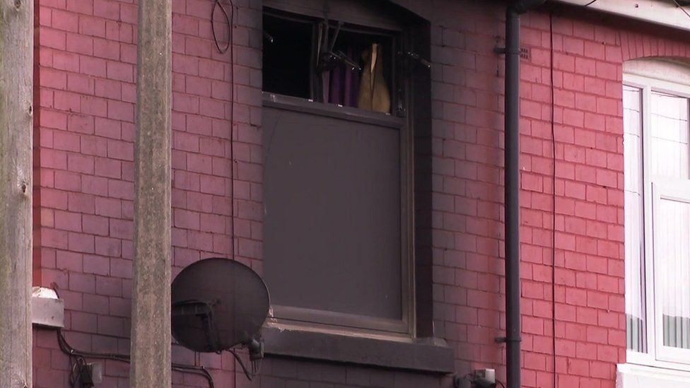 Window damaged by a fire in a house