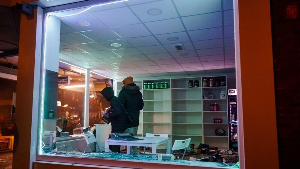 Looting in a shop after a large group of young people clashed police on the Beijerlandselaan in Rotterdam, The Netherlands