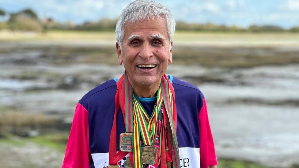 Anjana's dad Dev with his marathon medals