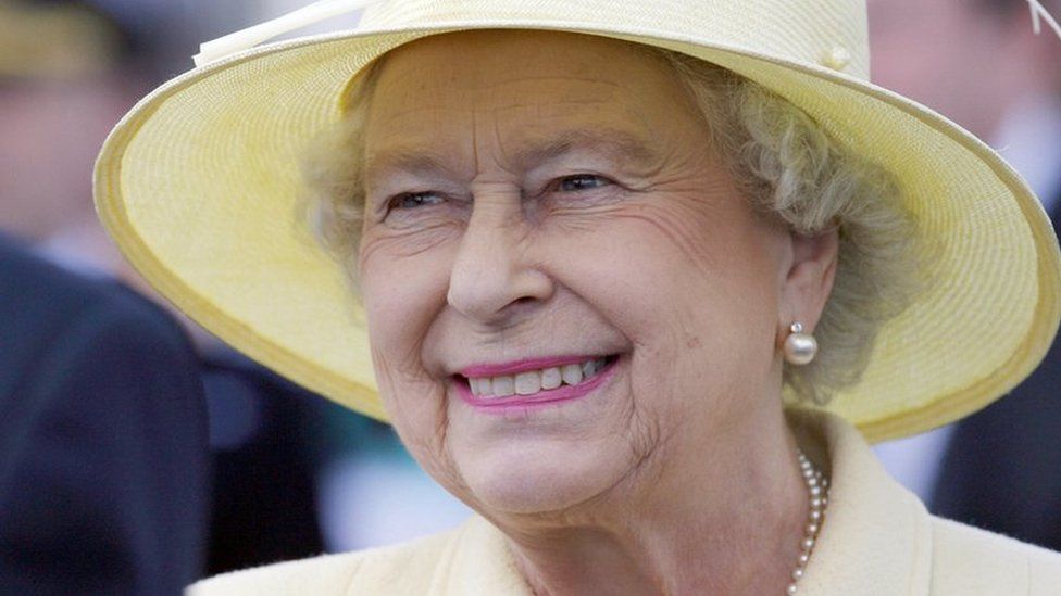 A smiling Queen greets guests during a garden party in Coleraine, Northern Ireland in June 2007 during an one-day visit to Northern Ireland