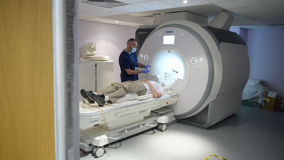 Aldo has an MRI in a London hospital during the treatment trial