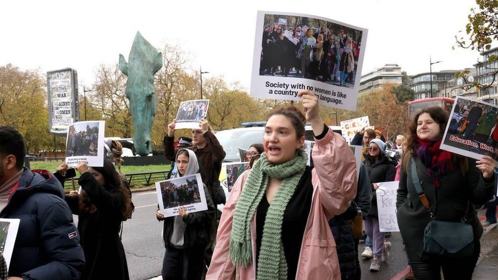 People take part in a march in London for the freedom of Afghan women and girls organized by Action for Afghanistan