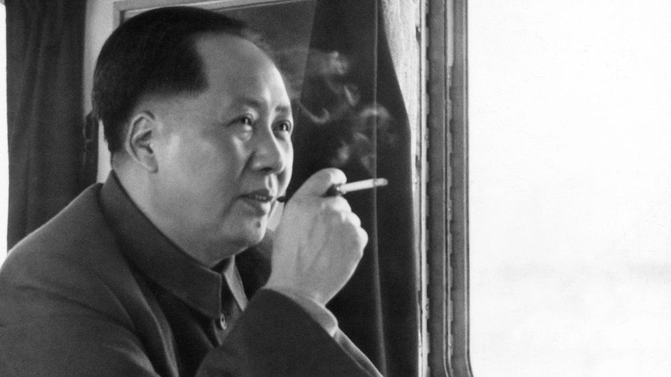 Mao Zedong smoking a cigarette