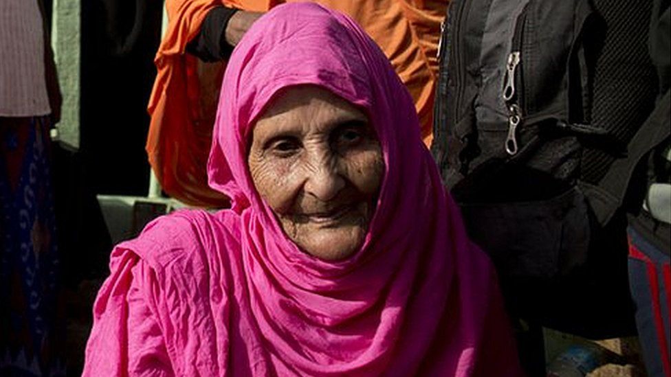 Elderly woman waiting in a boat, Bossasso, Somalia
