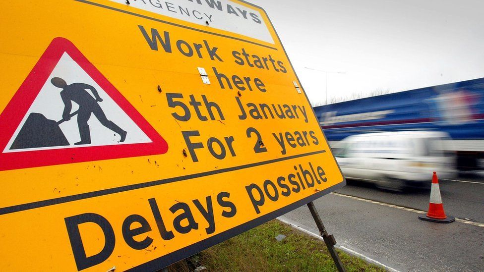 Roadworks sign - "work starts here 5th January for 2 years. Delays possible"
