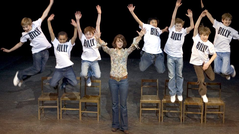 Gwynne with the young cast of Billy Elliot the Musical at London's Victoria Palace Theatre in 2006