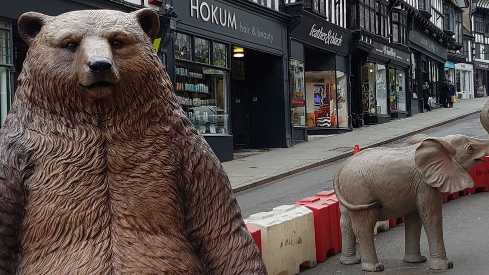 A fibre glass bear and baby elephant in Wyle Cop