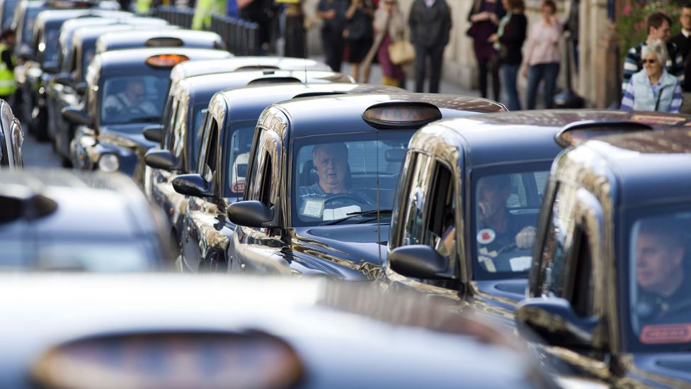 London taxi drivers block Whitehall during a slow driving protest in central London, 2014