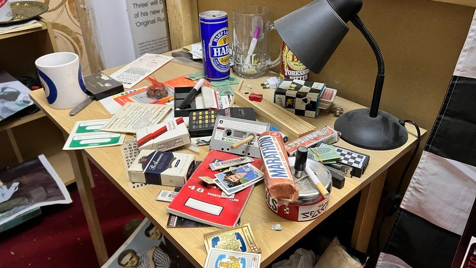 Bedroom exhibition featuring arty desk