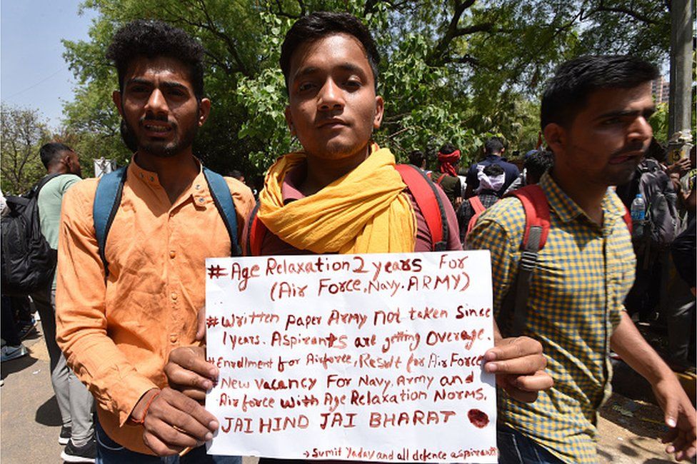 Aspirants show a letter written with blood demanding early jobs in defence services ( Army, Navy, and Air force) at Jantar Mantar on April 5, 2022 in New Delhi, India.