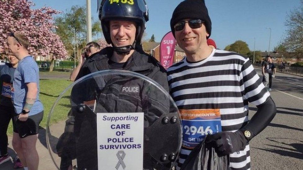 Lincoln police officer takes on 10K in full riot gear for charity - BBC ...