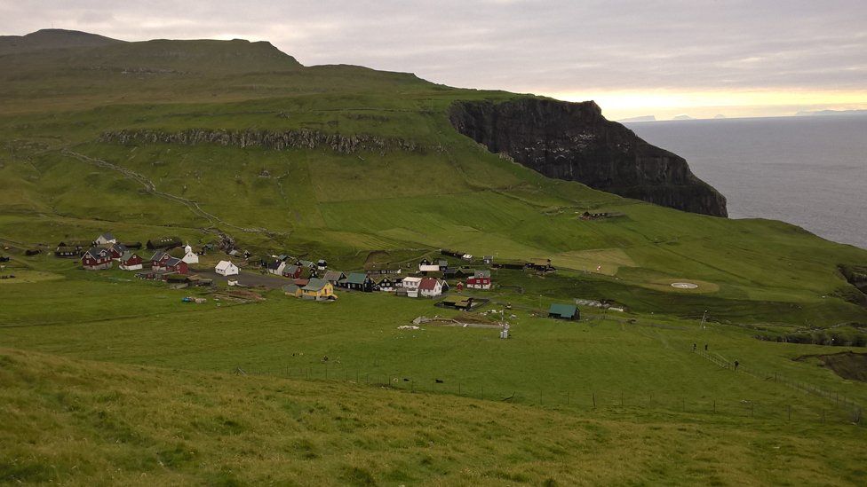 village nestled on clifftop