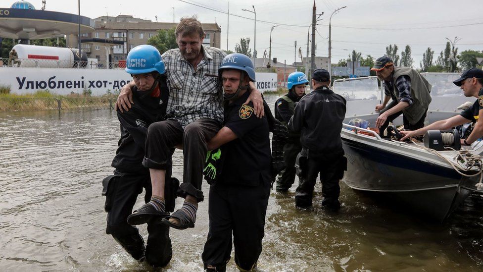 Authorities evacuate residents after flooding in Kherson