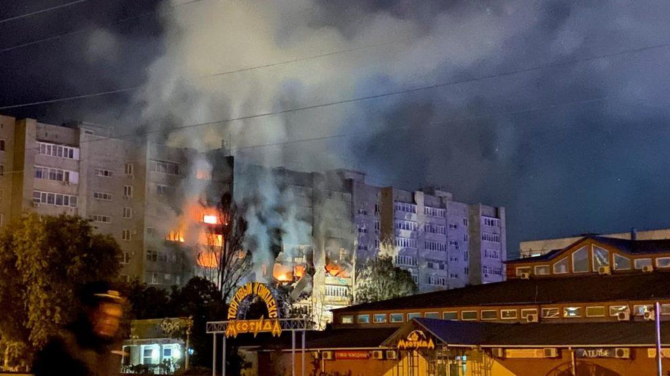 Russian tower block in flames after deadly warplane crash - BBC News