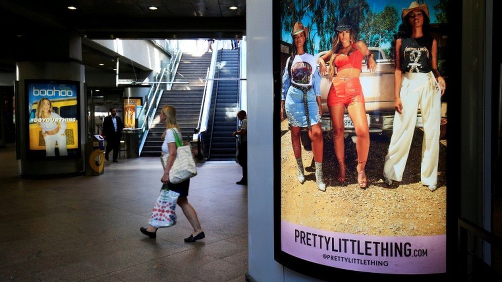 A billboard for Pretty Little Thing