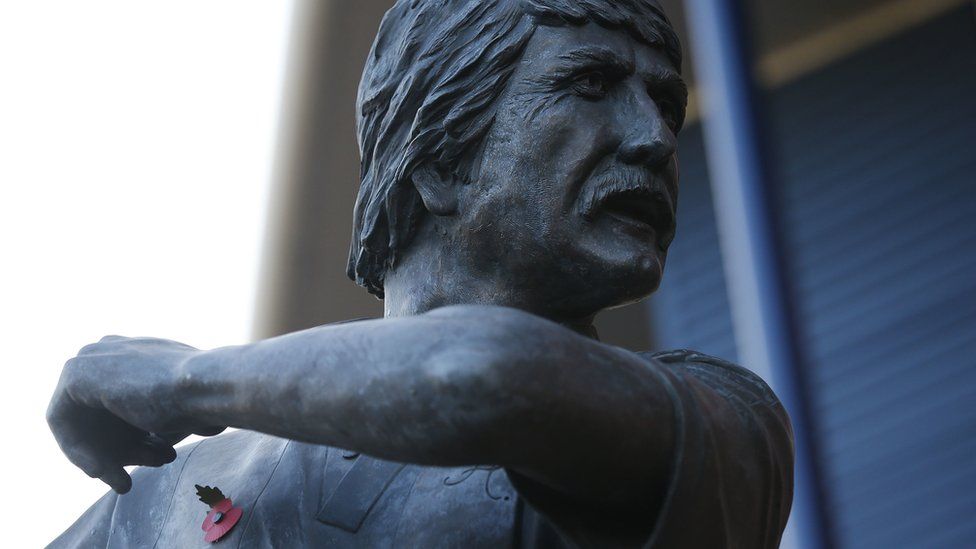 A statue of former player Tony Brown displays a poppy prior to the Sky Bet Championship match at The Hawthorns, West Bromwich