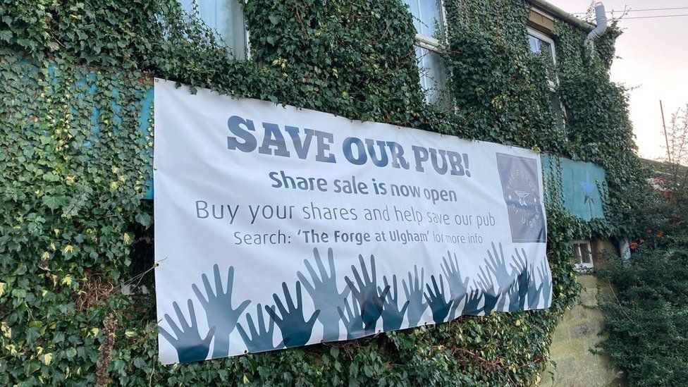 A Save our Pub sign outside