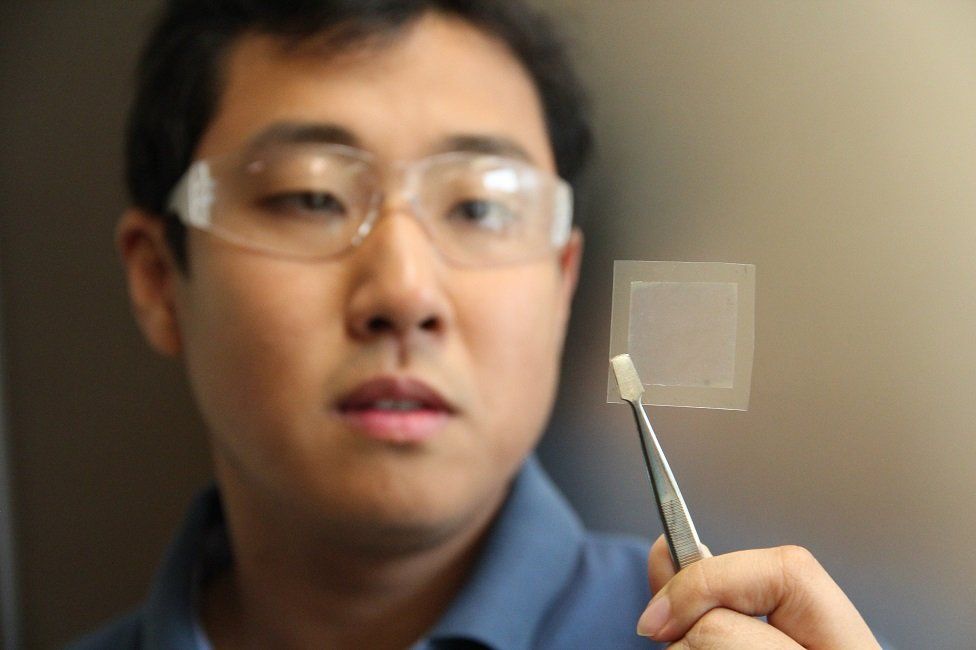 Dr Dong Han Seo, from Australia's CSIRO, holds a piece of graphene film