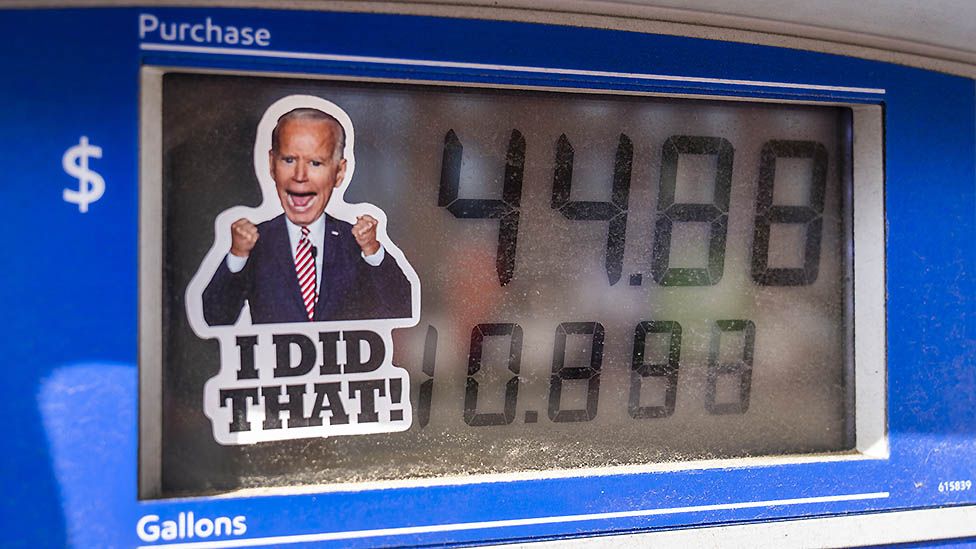 A Joe Biden sticker on a gasoline pump