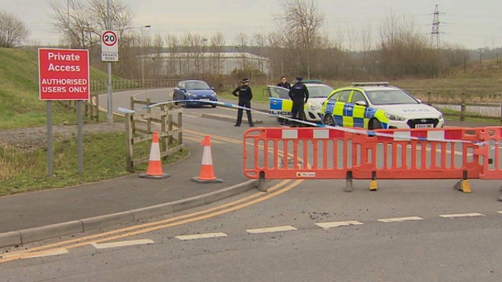 Police at the access lane in Avonmouth