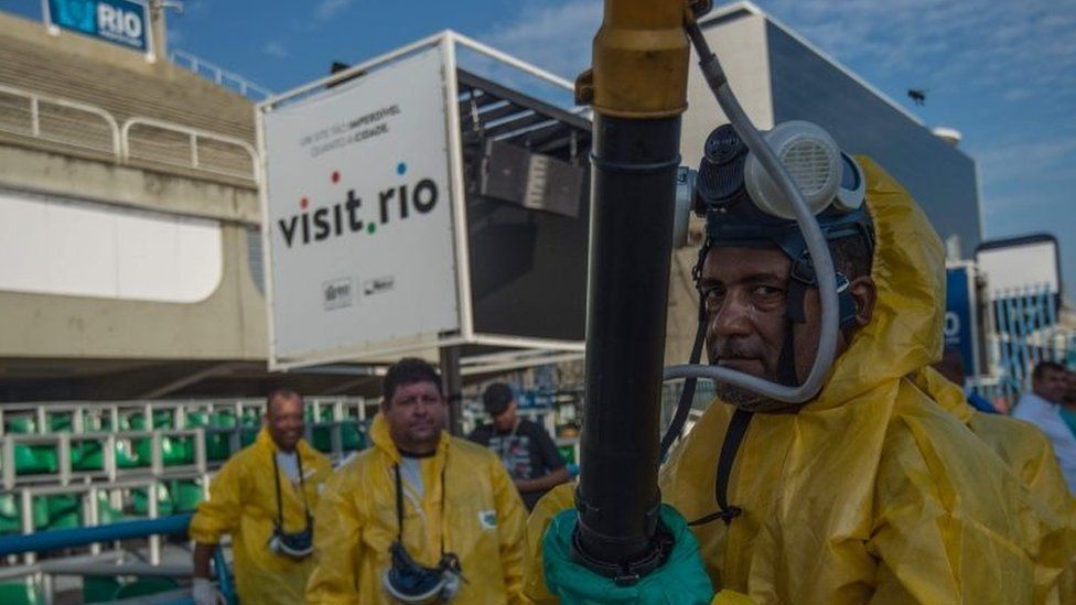 Municipal agents spray anti-Zika mosquito chemical at the sambadrome in Rio de Janeiro. Photo: 25 January 2016