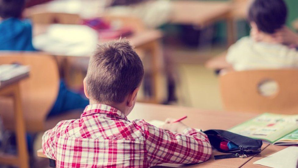 Child sitting in a classroom