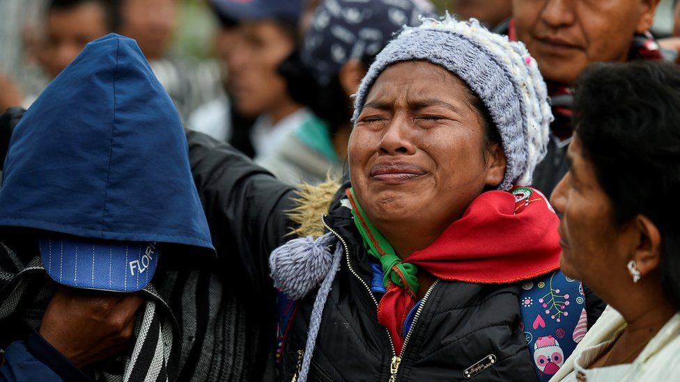 Indigenous people attend the funeral of five indigenous guards killed during an attack by suspected rebels in Tacueyo, rural area of Toribio, department of Cauca, Colombia, on October 31, 2019.
