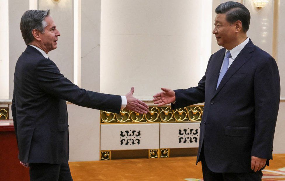 US Secretary of State Antony Blinken (L) shakes hands with China's President Xi Jinping in the Great Hall of the People in Beijing on June 19, 2023.