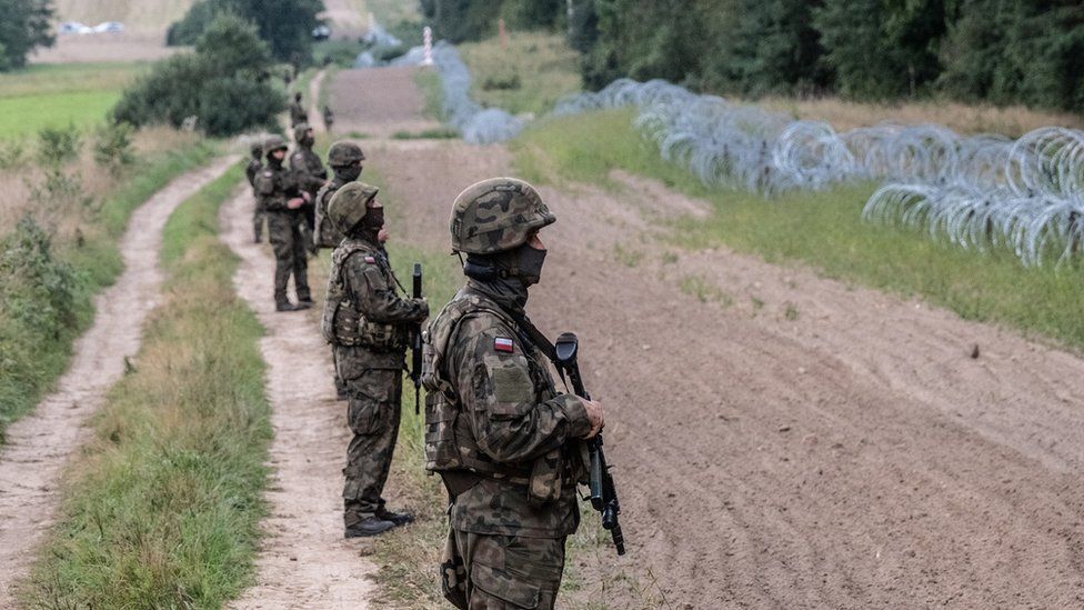 Polish army soldiers in front of border between Poland and Belarus. On August 26, 2021