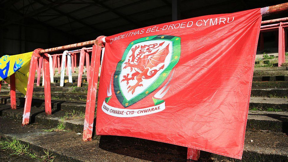 A fans' banner during the Welsh Cup final at the Racecourse Ground in 2016