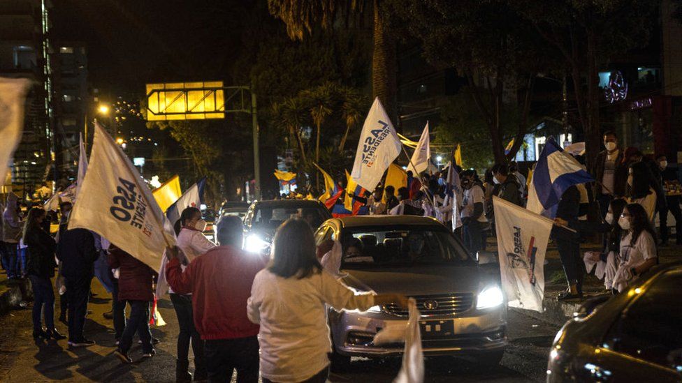 People celebrate the election result on Sunday