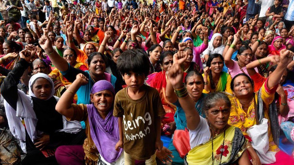 Mahul residents participate in a protest in June 2018