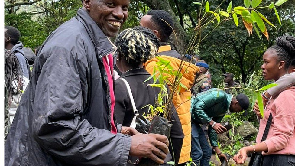 Kenyans plant trees in Kajiado, Kenya, on 13 November 2023