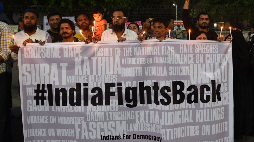 Protesters taking part in a candlelight vigil in Ahmedabad on 16 April 2018 in support of rape victims following cases in Jammu and Uttar Pradesh state.