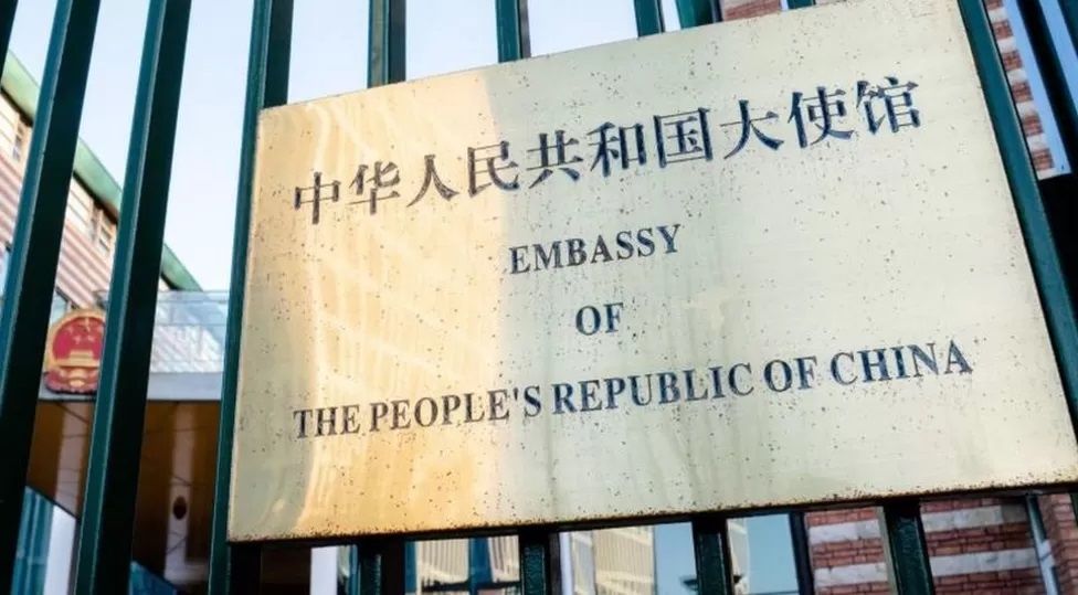 A sign that reads: Embassy of the People's Republic of China