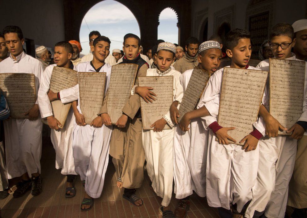 Moroccan children head to the Great Mosque of Sale to pray for rain on November 24, 2017 near the capital of Rabat. Parched Morocco which is heavily dependent on its agricultural sector is holding prayers for rain in mosques across the country under a royal decree. Like its Iberian neighbours to the north, Portugal and Spain, Morocco has suffered a severe shortage of rainfall since the end of the summer. Moroccan university studies show that temperatures have risen by up to 4 degrees Celsius since the 1960s and annual rainfall been on the decline.