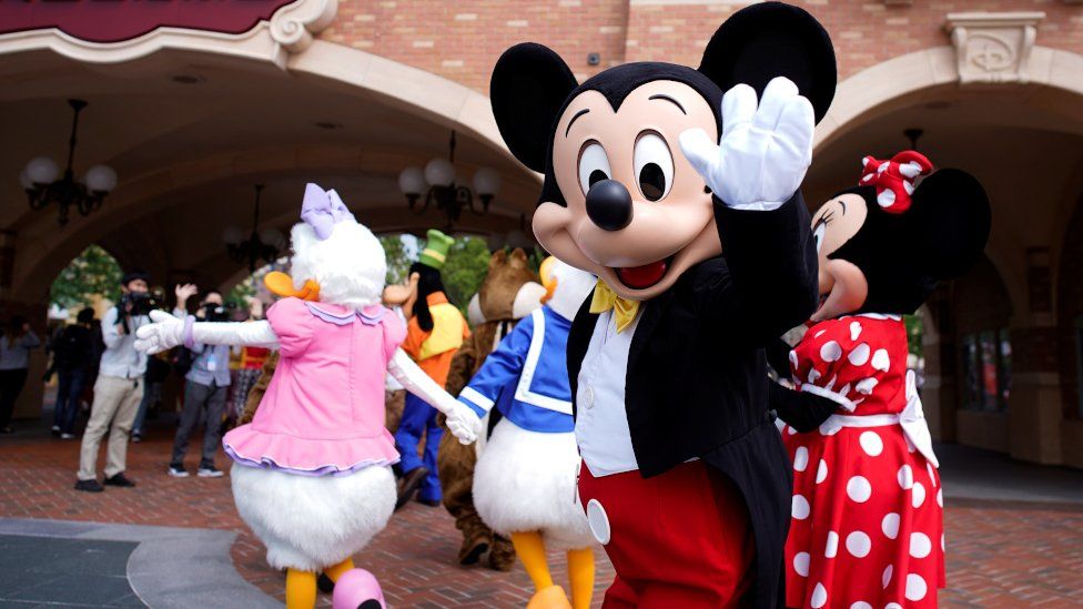 Mickey Mouse greets visitors