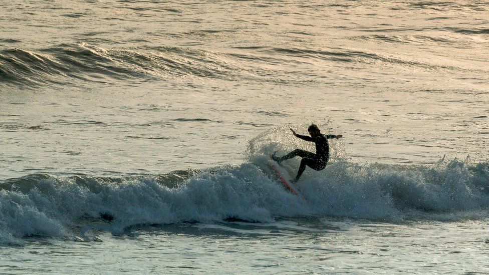 Surfer at Rest Bay, Porthcawl