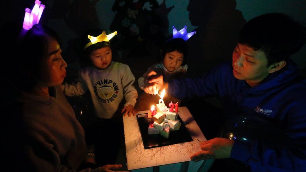 One family in Seoul lit a candle and shared a cake to start 2021