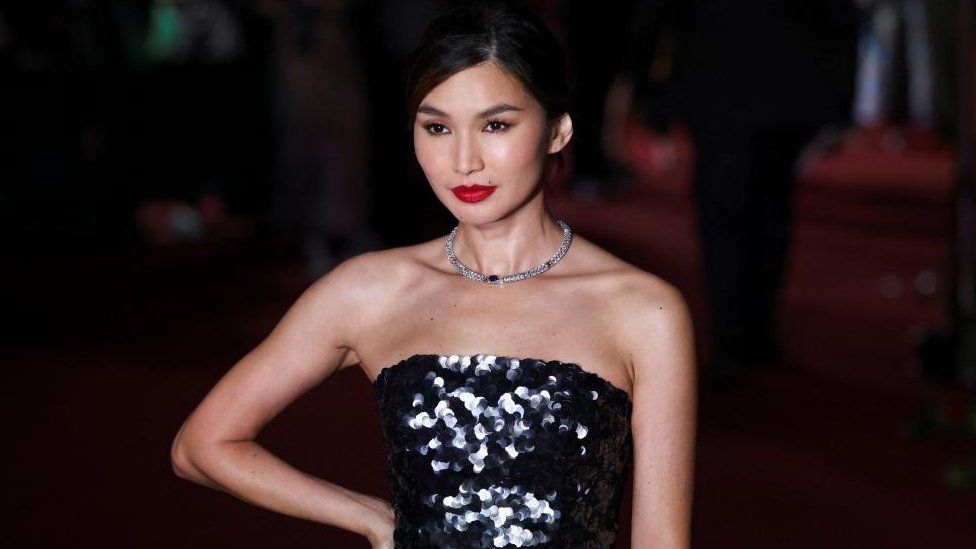 Actor Gemma Chan poses for a photo as she attends Vogue World in London